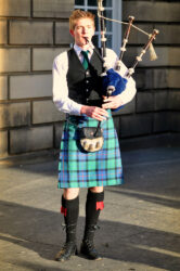 Edinburgh,-,Dec,31:,Unidentified,Scottish,Bagpiper,Playing,Music,With